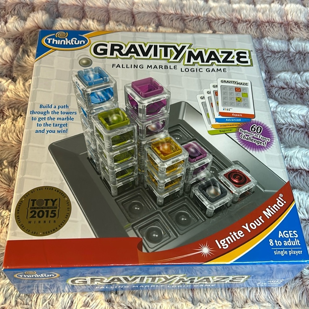 Gravity Maze falling marble logic maze game think fun